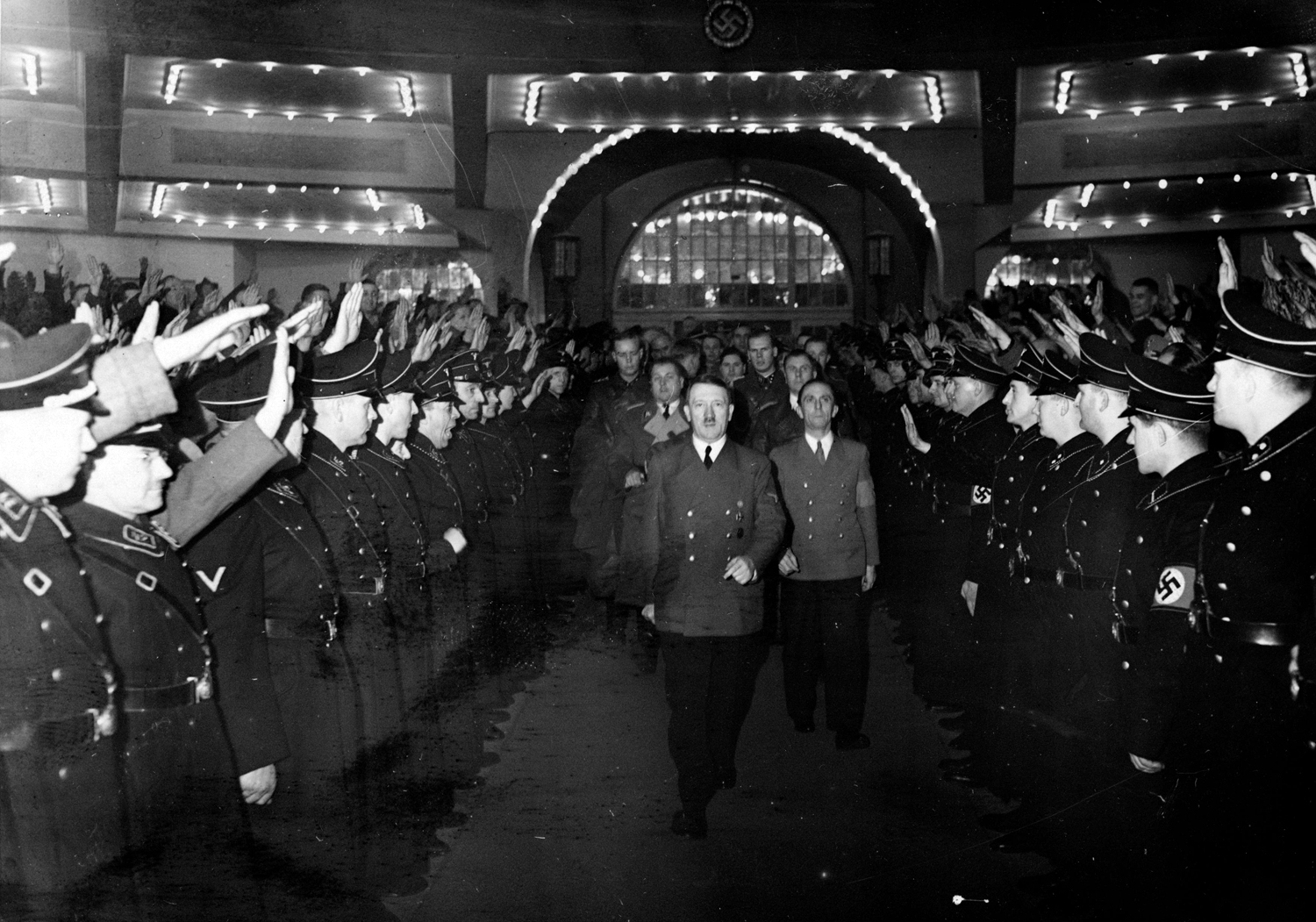 Adolf Hitler and Joseph Goebbels arrive at Berlin's Sportpalast for the 30th January celebration